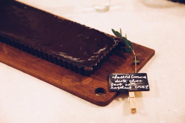 Dark chocolate tart with salted caramel and hazelnut crust